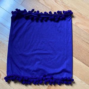 Purple snood with pom poms